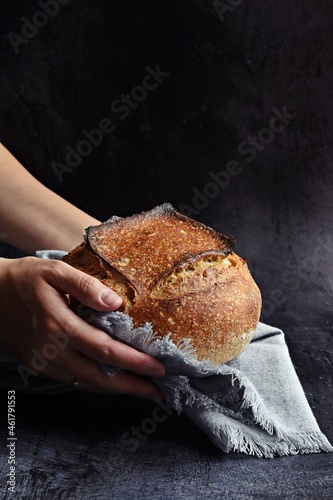 Homemade sourdough bread on the dark background