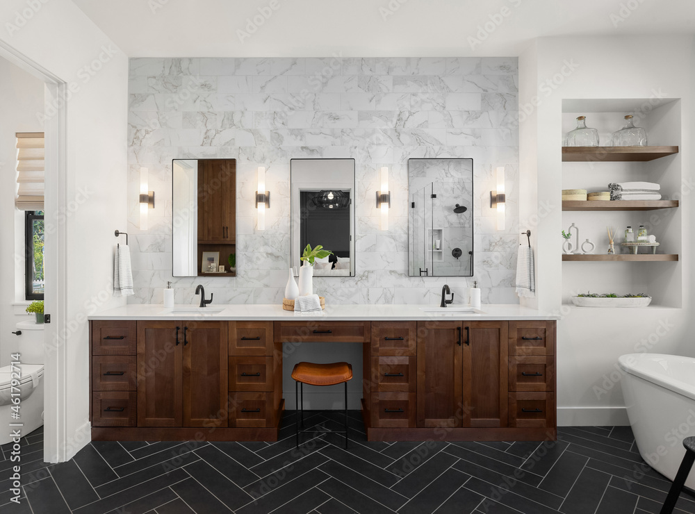 Gorgeous Ensuite Bathroom In Luxury Home. Features Black Herringbone Tile  Floor, Marble Tile Backsplash And Wall, Double Vanity And Sconce Lights.  Stock Photo | Adobe Stock