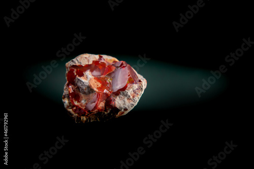 Fire Opal with lighted dark background