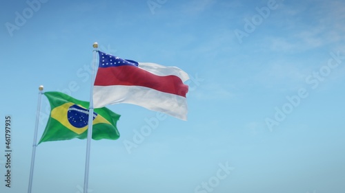 Waving flags of Brazil and the Brazilian state of Amazonas against blue sky backdrop. 3d rendering photo