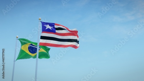 Waving flags of Brazil and the Brazilian state of Maranhão against blue sky backdrop. 3d rendering photo