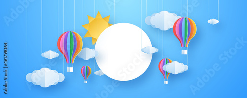 Colorful sunny sky background illustration in 3d paper cut art style. Creative imagination or children design backdrop. Papercut design with empty circle frame.
