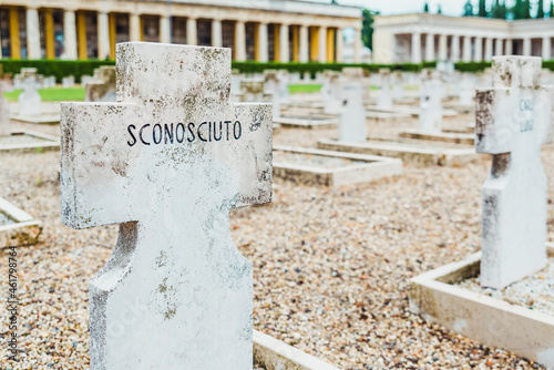 Marble tombs in the Verona cemetery in honor of the unknown soldier, with the text Sconosciuto. photo