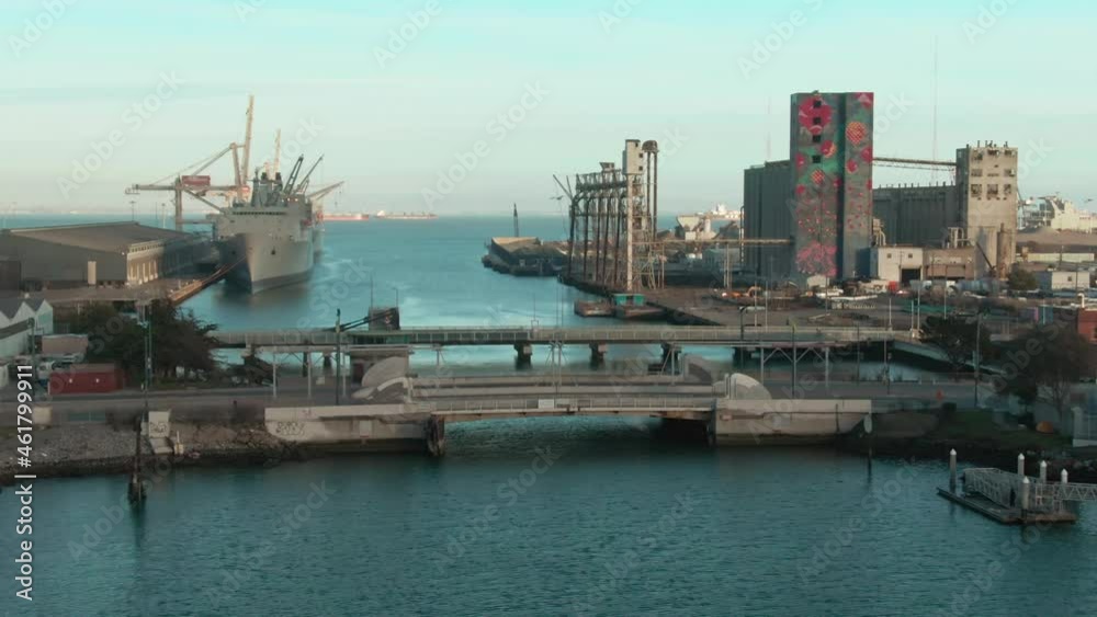Aerial: Ships docked in Islais Creek in the Central Waterfront. San Francisco, California, USA
