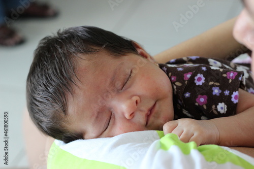rosto bebê dormindo photo