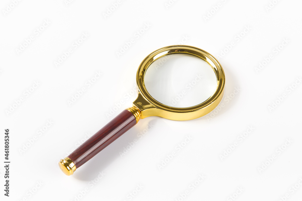 brass magnifying glass isolated on white background brass magnifying glass isolated on white background