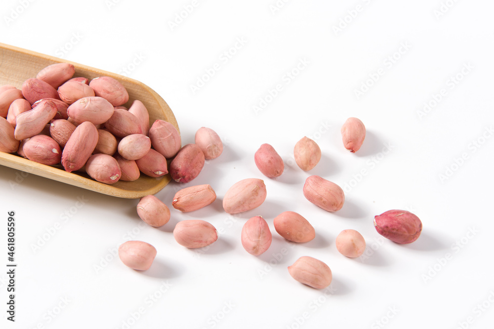 raw peanuts seed in a plate isolated on white background raw peanuts seed in a plate isolated on white background