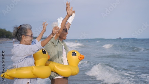 Bilde på lerret senior couple wear rubber ring take off medical face mask and running to the bea