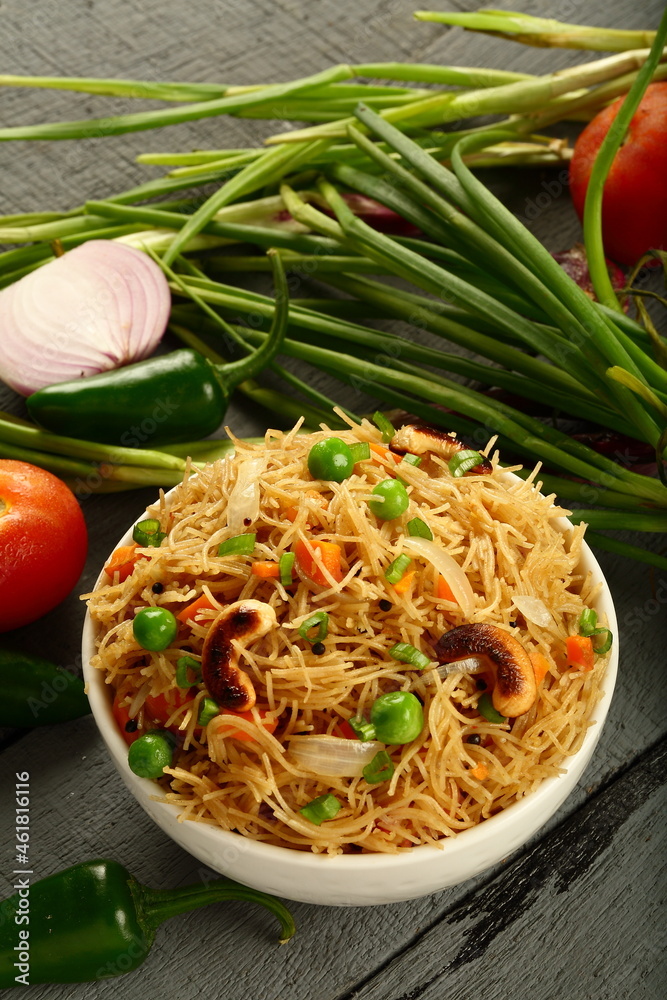 Φωτογραφία Bowl of delicious Indian breakfast dish,  semiya, vermicelli upma, uppuma, traditional recipes background