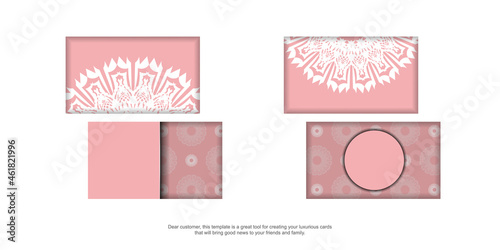Business card in pink with vintage white pattern for your personality.