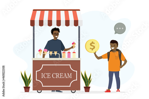 African american schoolboy buys ice cream in mobile kiosk. Small or local business. Male seller holds ice cream, boy gives money.