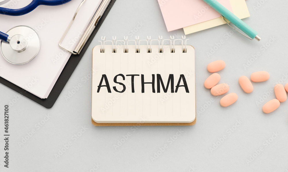 Paper with text ASTHMA on a table with stethoscope. Medicina Stock ...