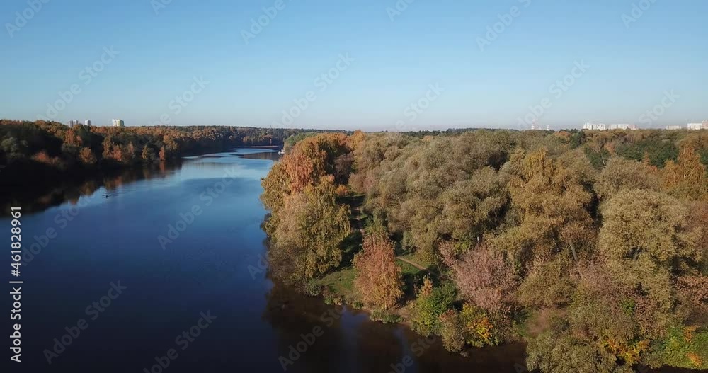 4K bright sunny autumn morning aerial drone video of Moskva River and yellow red forest park in Moscow, Russia 4K bright sunny autumn morning aerial drone video of Moskva River and yellow red forest park in Moscow, Russia