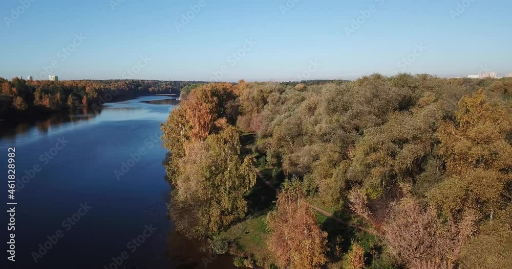 4K bright sunny autumn morning aerial drone video of Moscow River and yellow red forest park in Moscow, Russia 4K bright sunny autumn morning aerial drone video of Moscow River and yellow red forest park in Moscow, Russia