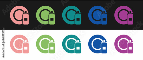 Set Dishwashing liquid bottle and plate icon isolated on black and white background. Liquid detergent for washing dishes. Vector