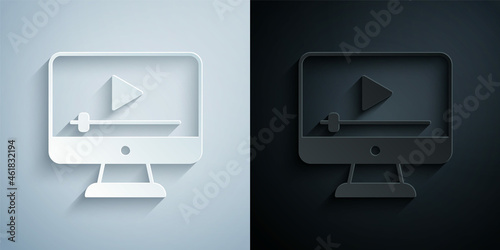 Paper cut Online play video icon isolated on grey and black background. Film strip with play sign. Paper art style. Vector