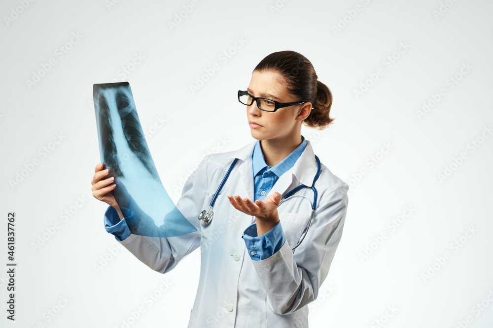 pretty woman in white coat x-ray diagnostics examination pretty woman in white coat x-ray diagnostics examination