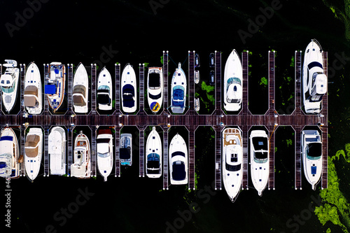 Aerial top down view of boats in a dock