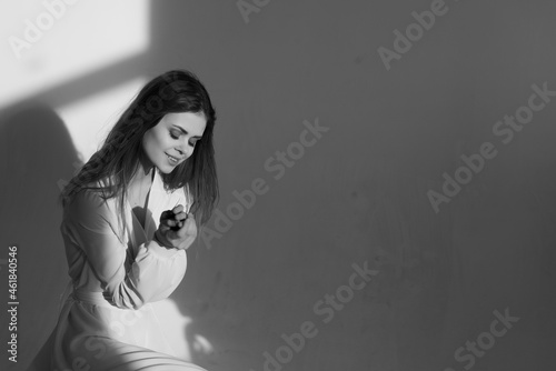 woman on in a white dress black and white photo this is a model coding