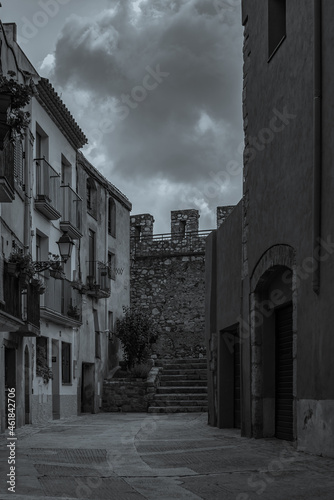 Black white picture of the fortified town Montblanc in Tarragona, Catalunya, Spain, vertical