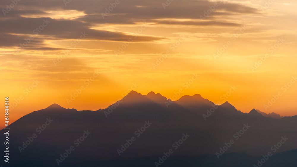 Dark mountain peaks in the setting sun, Tatra Mountains, Poland Dark mountain peaks in the setting sun, Tatra Mountains, Poland