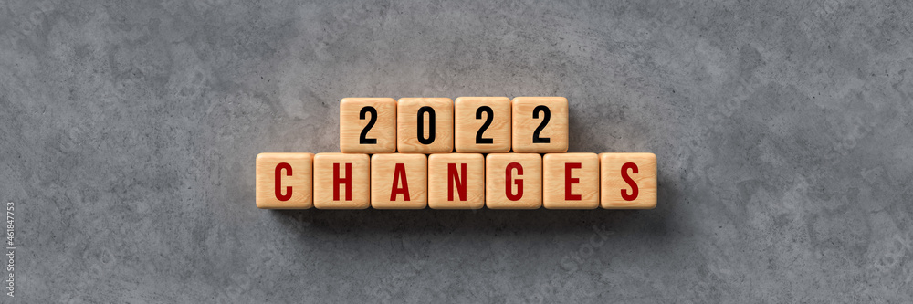 wooden cubes with message 2022 on concrete background wooden cubes with message 2022 on concrete background