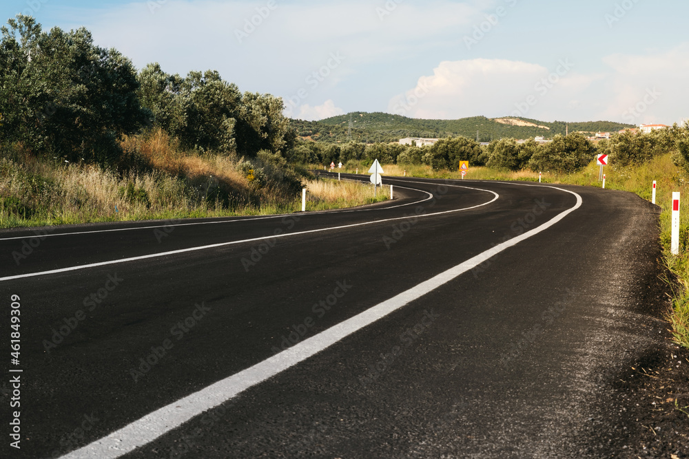 Bending road background on daylight.