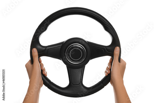 Woman with steering wheel on white background, closeup photo