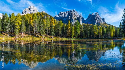 Autumn colors on the lake of Antorno. Magical glimpses of the Dolomites. Three peaks of Lavaredo © Nicola Simeoni