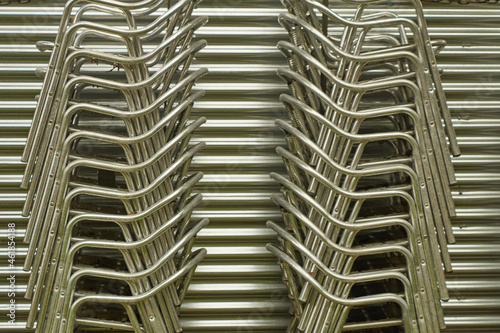 Chairs stacked forming rhythm