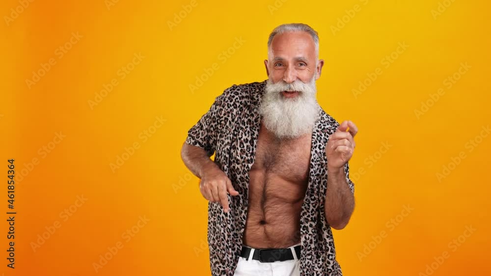 Cheerful carefree grandpa enjoy disco clubbing beach party concept