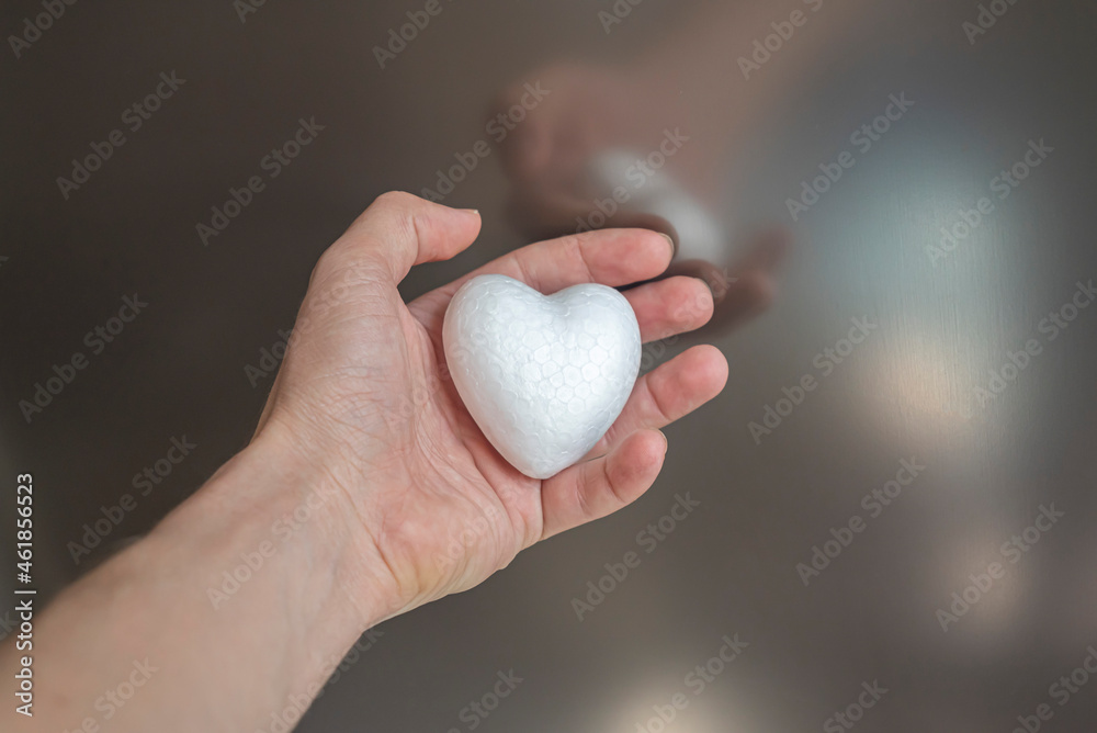 White heart in female hand.Organ donation and insurance concept.
World heart health concept. World organ donation day. Healthy heart concept for healthy life. Selective focus. White heart in female hand.Organ donation and insurance concept.
World heart health concept. World organ donation day. Healthy heart concept for healthy life. Selective focus.