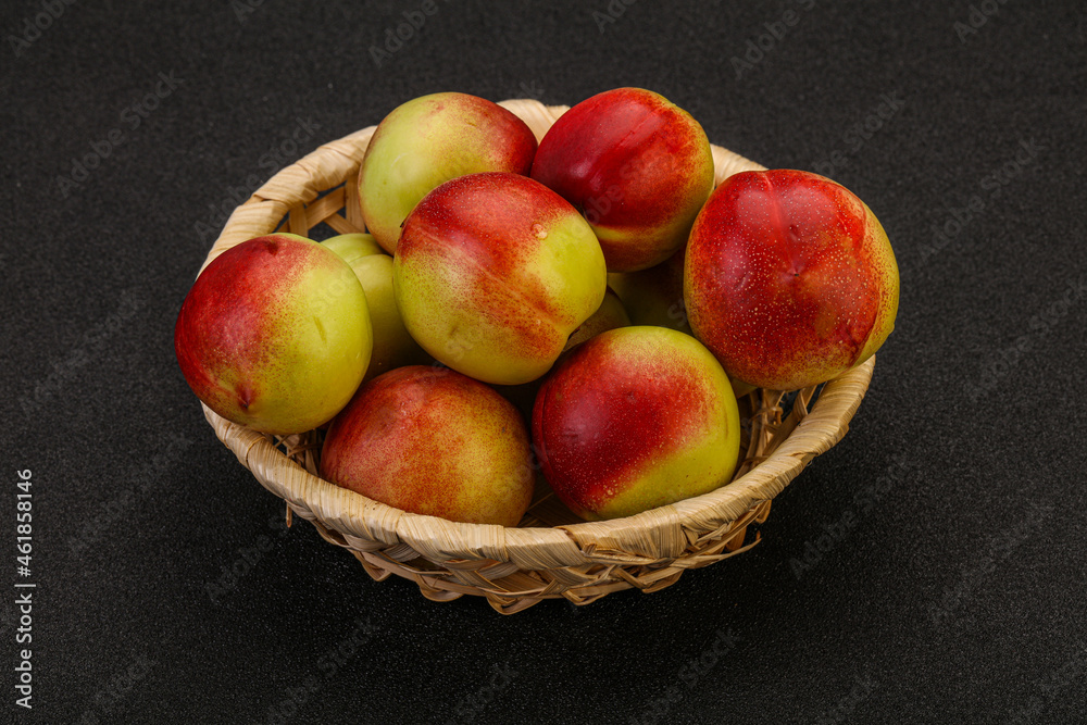 Sweet small nectarines in the basket Sweet small nectarines in the basket
