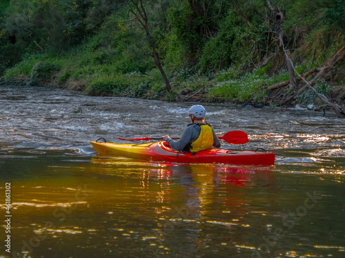 Kayak Leaving Smooth Water