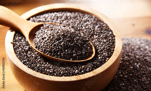 Obraz na płótnie Bowl of chia seeds on wooden table