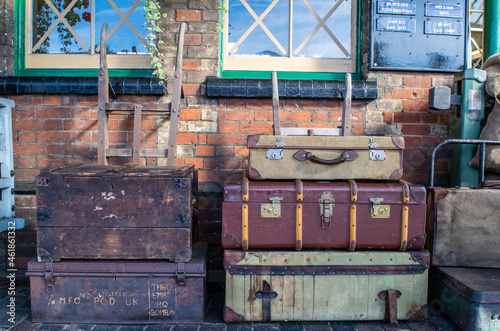Bilde på lerret Sheringham, Norfolk, UK - SEPTEMBER 14 2019: WWII vintage suitcases on a train p