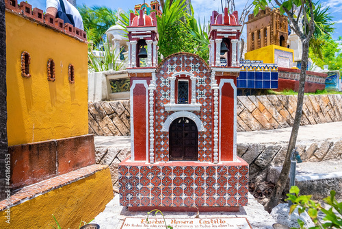 Multicolored Mexican catholic cemetery in Xcaret ecotourism park. Famous ecotourism and archaeological park © ingusk