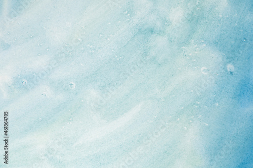 watercolor abstract art handmade diy painting on textured paper background. watercolour backdrop. painted blue green streaks like the sky or the sea surface
