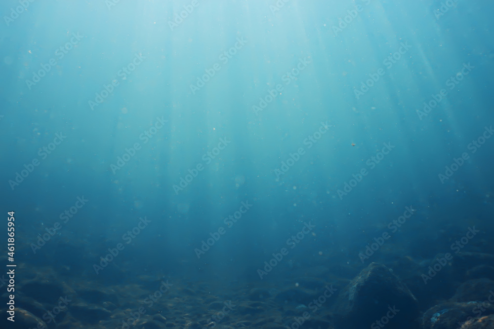 sun rays under water blue ocean background, abstract sun light in water wallpaper