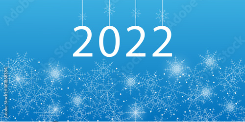 New Year winter background for banner with snowflakes and numbers of new 2022 year