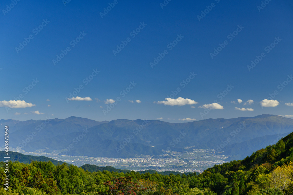 Naklejka premium 飯綱高原から見渡す秋の善光寺平