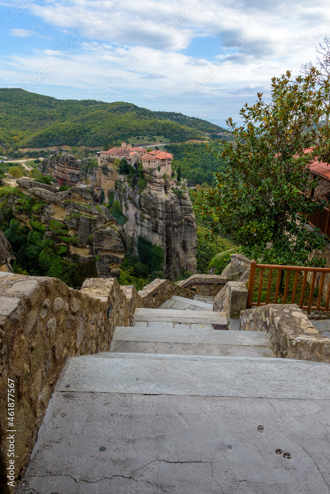 Stairs leading  to Great meteoro monastery and Varlaam monastery as a background  , an unesco world heritage site,  located on a unique rock formation  above the village of Kalambaka.