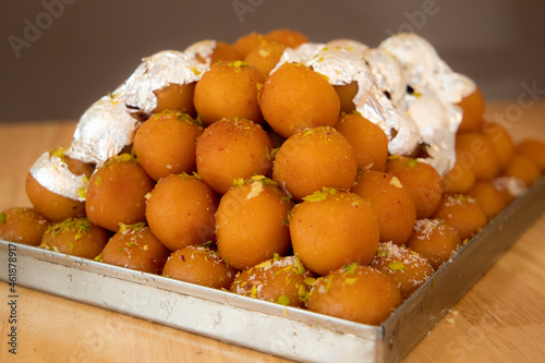Irresistible Brown Gulab Jamun: Tempting Image of India's Favorite Sweet, Perfect for Food Lovers and Dessert Enthusiasts - High-Quality Picture