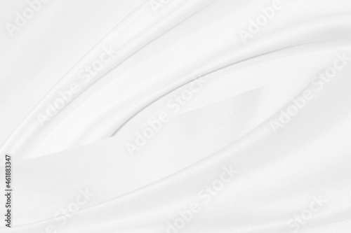 Clean woven beautiful soft fabric abstract smooth curve shape decorative fashion textile silver white background © Topfotolia