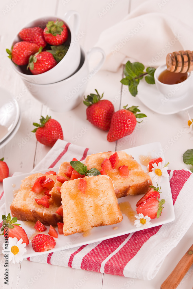 Lemon pound cake with honey and fresh strawberries. Lemon pound cake with honey and fresh strawberries.