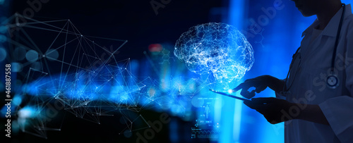 Obraz na płótnie Female Doctor surgeon analyzing patient brain with human anatomy on technological digital tablet futuristic Ui and digital holographic innovative with science and medicine concept. w salonie