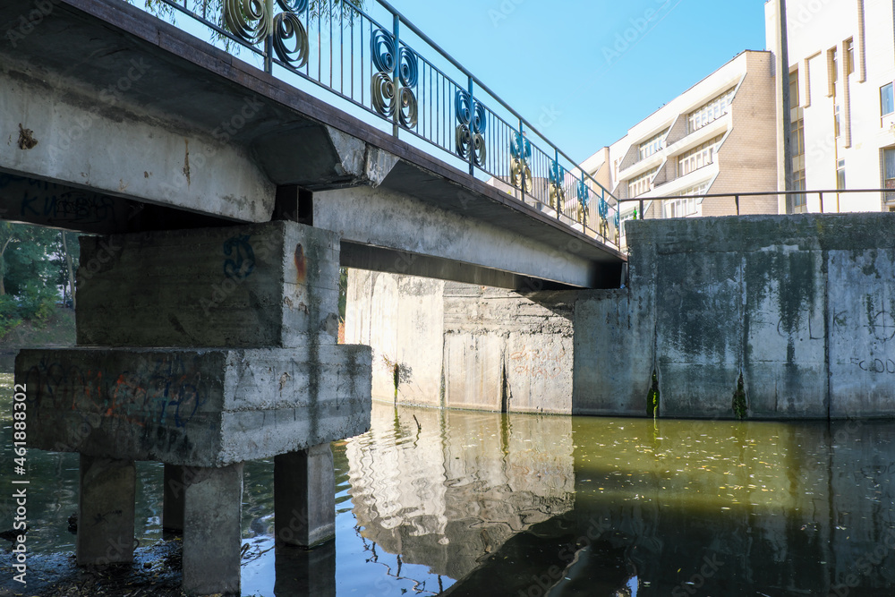 Cityscape with a small lake