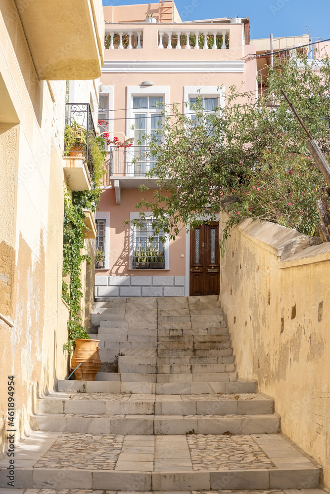 Obraz premium Syros island Cyclades Hermoupolis village building stairs at capital destination Greece. Vertical