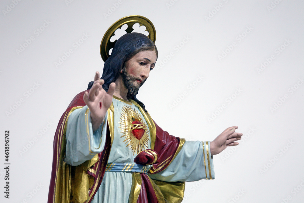 Obraz premium Sacred Heart of Jesus, statue in the church of Assumption of the Virgin Mary in Brodsko Vinogorje, Croatia