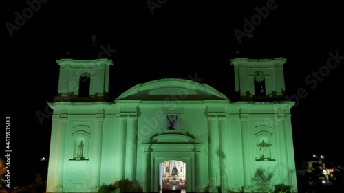 Aerial view over the facade of a cathedral during the night photo